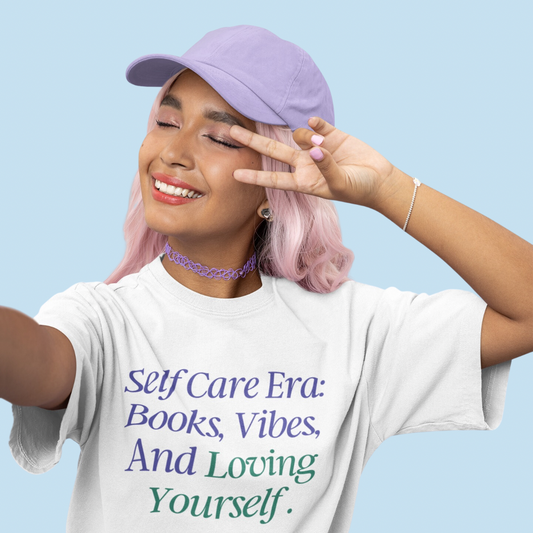 Romance book tee that reads self care era: books, vibes, and loving yourself