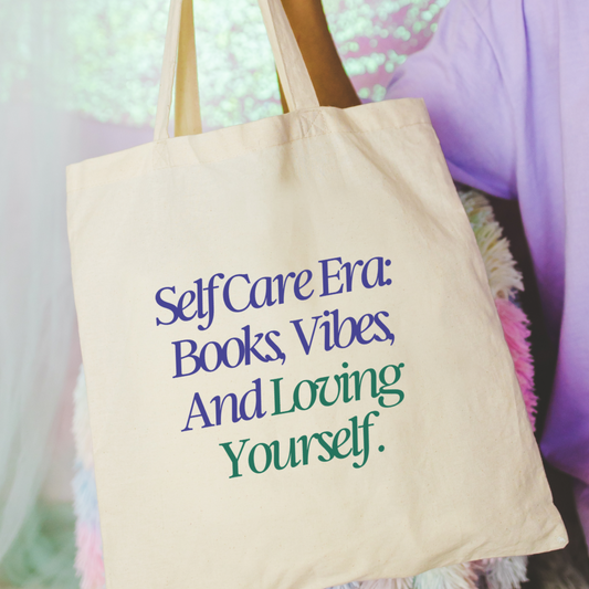 Romance book tote that reads  Self Care Era: Books, Vibes, And Loving Yourself Tote Bag