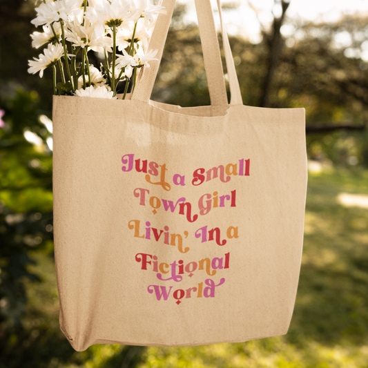 Romance book tote that reads reads just a small town girl living in a fictional world